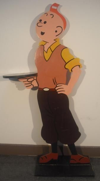 null Personnage Tintin en bois peint tenant un présentoir