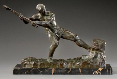 Alexandre OULINE (XIXe-XXe siècle) Le bucheron Bronze à patine vert foncé, signé...