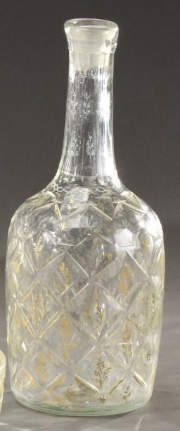 null 
Beikos, bouteille en verre taillé, décor de fleurs à l'or fin
 
H. 23 cm
 
