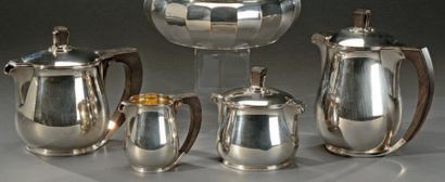 KELLER, 1930 Service à thé et à café en argent uni de forme balustre, les anses et...