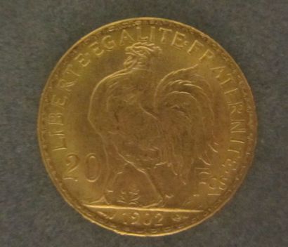 null Une pièce en or, 20 Francs 1902
Poids :  6,6 g
 