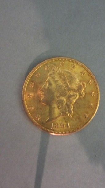 null Pièce en or jaune de 20 US Dollars, type Liberty, atelier San Francisco 1894

Poids...