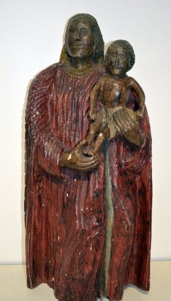 null Vierge à l'enfant en bois polychrome. 

XVIIIe-XIXe siècle 

H. 63 cm

(Fen...