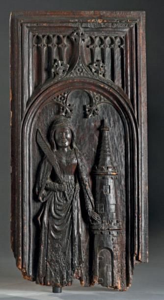 null Panneau en bois sculpté représentant sainte Barbe
XVIe siècle
H. 77 cm - L....