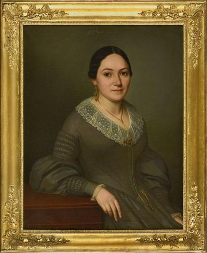 ÉCOLE FRANÇAISE du milieu du XIXe siècle 
Portrait de femme à la robe au col de dentelle
Huile...