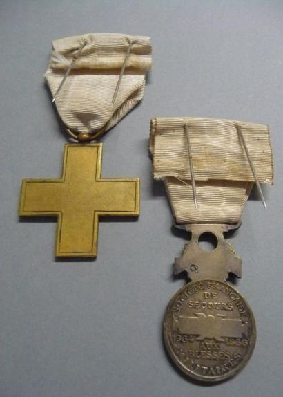 null FRANCE

Lot de deux médailles de la Croix Rouge 

Une 70-71 en bronze, ruban...