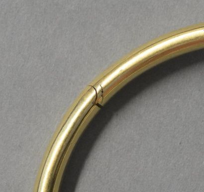 null Bracelet jonc ouvrant en or jaune 18K (750/°°)
Poids brut 11,7 g