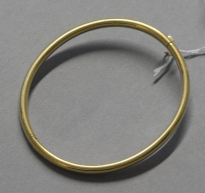 null Bracelet jonc ouvrant en or jaune 18K (750/°°)
Poids brut 11,7 g