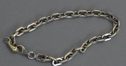 null Bracelet en or gris 18K (750/°°) maille forçat rectangulaire, le fermoir agrémenté...