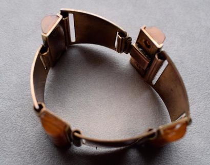 null Bracelet articulé en métal, les maillons de forme géométrique alternés de motifs...