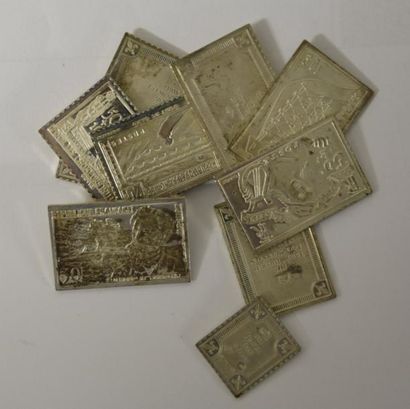 null 
Le médailler franklin: lot de 10 plaques/timbres en argent:


- 8 ex L. 4 cm...