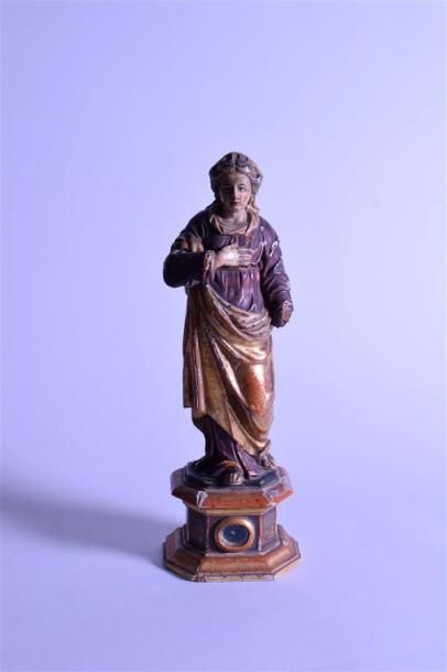 null Statuette reliquaire de sainte Anne en bois scupté et relaqué

Travail anci...