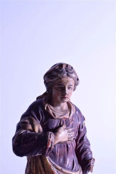 null Statuette reliquaire de sainte Anne en bois scupté et relaqué

Travail anci...