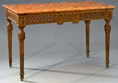 null Table console en bois sculpté, la ceinture à entrelacs ajourés. Tablier à quatre...