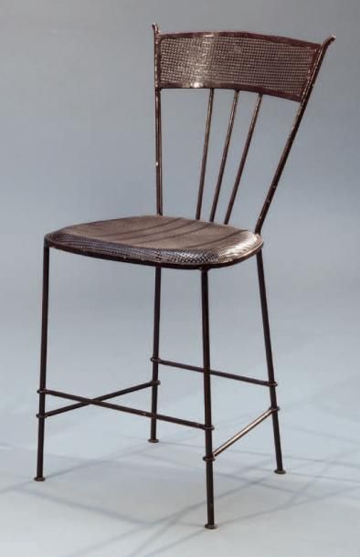 Mathieu MATÉGOT (1910-2001) Chaise modèle «Napoléon» en tôle perforée et laquée brun
Circa...