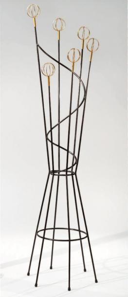Roger FERAUD (1890-1964) Porte-manteau modèle «Astrolabe», structure en métal laqué...