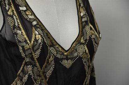 null Robe du soir, vers 1925
Robe sans manches décolletée en V devant et dos, en...