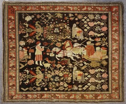 null Karabagh ancien
Très rare tapis à décor sur fond noir d'une scène paysanne représentant...