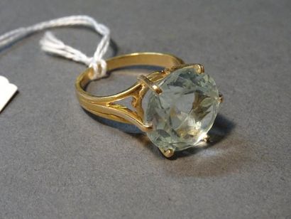 Bijoux - Joaillerie Bague en or jaune 18K (750/°°) sertie d'une pierre bleue d'imitation...