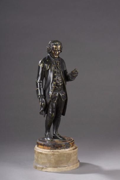 null Statuette en bronze patiné représentant Jean-Jacques Rousseau en pied, en redingote....