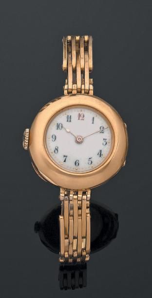 null Montre-bracelet de dame, en or jaune 750 millièmes, la montre de forme ronde,...