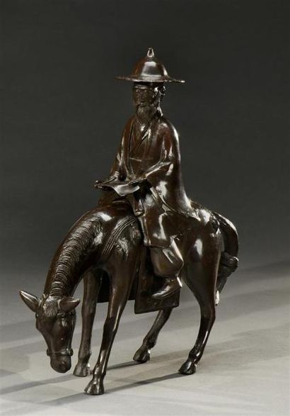 Art d'Asie JAPON - Epoque MEIJI (1868 - 1912) Groupe en bronze patiné brun représentant...