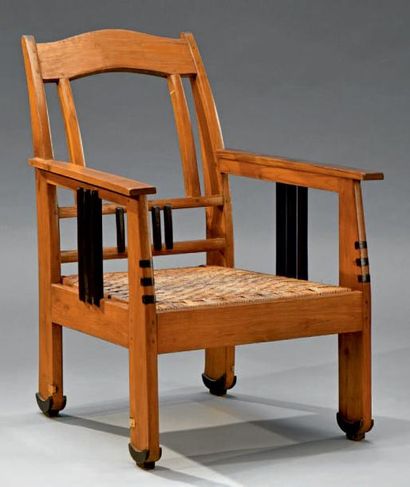 ÉCOLE D'AMSTERDAM vers 1920 Rare fauteuil constructiviste en bois exotique. Les montants...