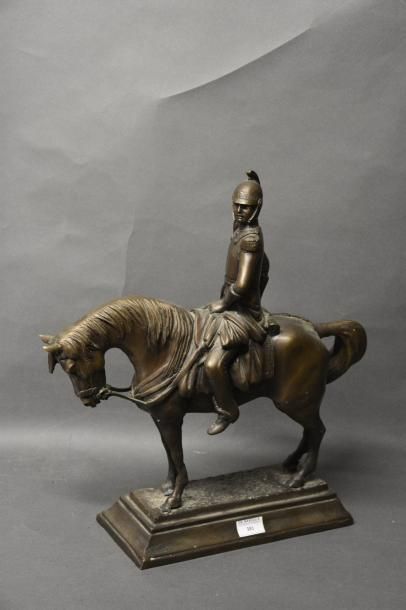 OBJETS D'ART Dragon à cheval Bronze à patine brune H. 43 cm