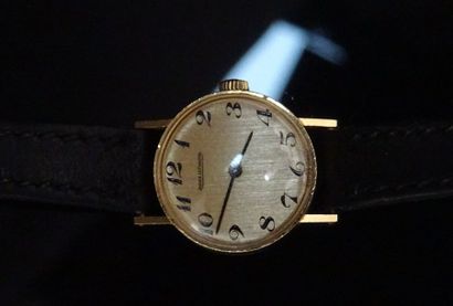 JAEGER LECOULTRE Montre de dame en or jaune, cadran rond, chiffres arabes, mouvement...