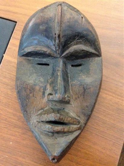 null Masque Dan
Côte d'Ivoire
H. 26 cm
Très ancien masque dan au visage concave et...