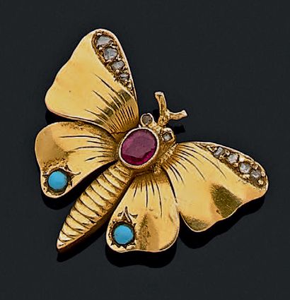 null Broche "papillon" en or jaune 750 millièmes, ornée d'une pierre d'imitation...