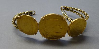 Bijoux - Joaillerie Bracelet orné de trois pièces en or jaune 18K (750/°°) Poids...