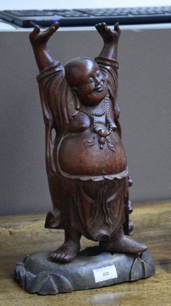 null Bouddha s'étirant

Statuette en bois fixée sur socle en bois

H. 36 cm 

Fe...