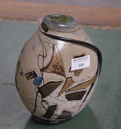 null Robert PIERINI (né en 1950)

Vase en verre soufflé à inclusions

Signé et daté...