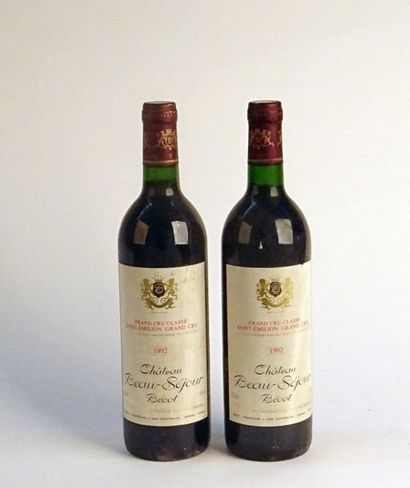 null 2 B CHÂTEAU BEAU SEJOUR BECOT (e.t. légères + 1 accroc) GCC1B St Emilion 19...