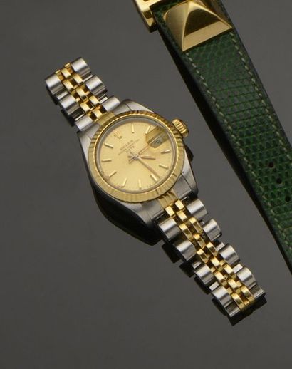 ROLEX Montre de dame en acier et or jaune 18K (750°/°°), modèle «Oyster Perpetual...