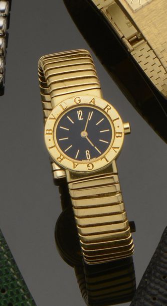 BULGARI Montre de dame en or jaune 18K (750°/°°), modèle «Bulgari
Bulgari», la lunette...