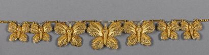 null Collier orné de cinq motifs de papillons en or jaune 18K (750°/°°) filigrané...