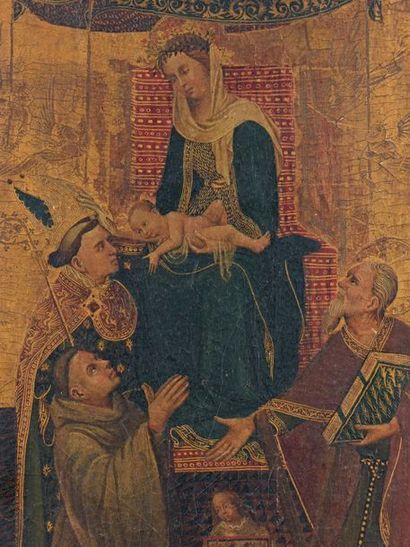 École FRANÇAISE vers 1400-1410 
Moine franciscain en prière devant la Vierge et l'Enfant...