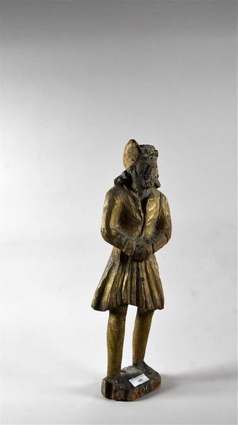 null Statue en bois doré représentant un personnage de la Haute Epoque H. 45 cm L....