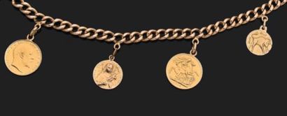 null Bracelet articulé en or jaune 750 millièmes, les maillons retenant quatre médailles...