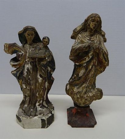 null Deux statuettes en bois polychrome et or représentant la Saint Vierge et la...