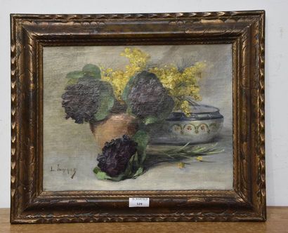 Léon-Régis JUNIQUE (1875-1945) Nature morte aux violettes
Huile sur toile signée...
