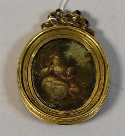 null Miniature ovale représentant une femme et l'amour, dans un cadre en métal doré...