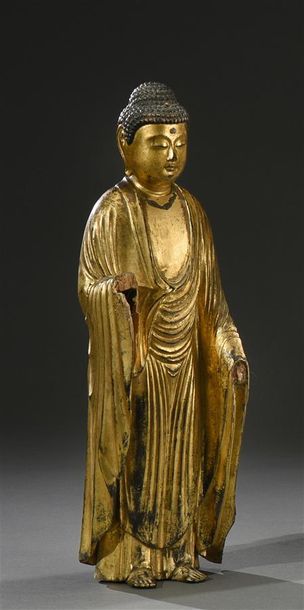 JAPON - Époque EDO (1603- 1867) Bouddha debout en bois laqué noir et or, à incrustations...