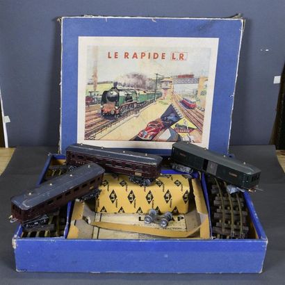 null Train électrique Le Rapide, comprenant une locomotive, trois wagons d'origine,...