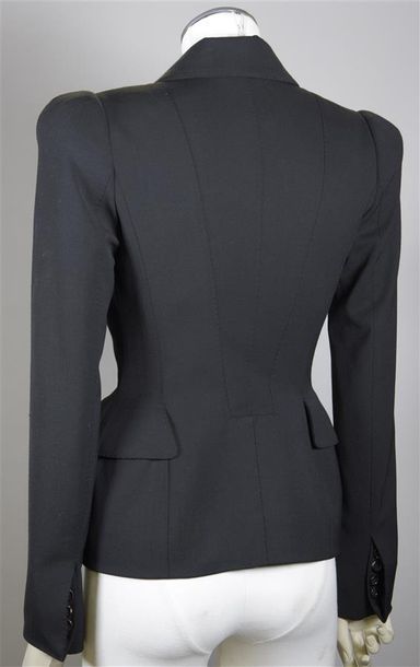 null Tom FORD, 2017. Veste à basque en gabardine de laine et polyester noir à surpiqûres...