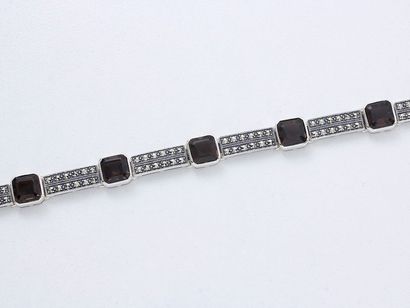 null Bracelet articulé en argent 800 millièmes, composé de quartz fumés taille émeraude...