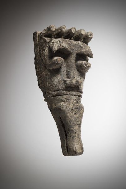 null IJO,

Nigeria. Anthropozoomorphic mask

with his chin extended by a crocodile's...