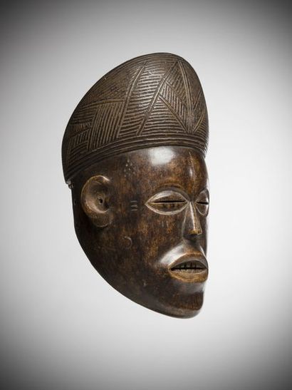 null LWENA, Angola. Mask "mwana po". As with the neighbouring Tchokwé, this mask...